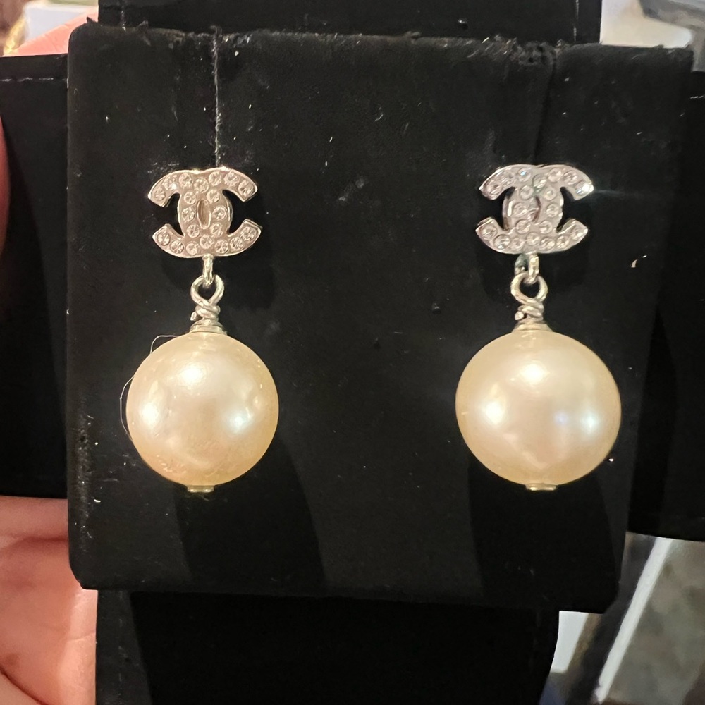 Chanel classic pearl drop crystal CC earrings for pierced ears.